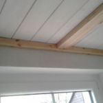 Magnetic fastening of profile strip for wooden ceiling