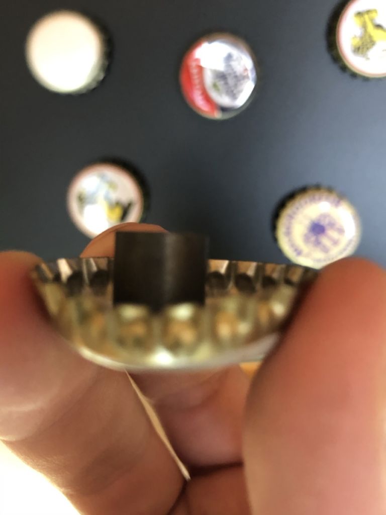 View of used magnet in bottle cap
