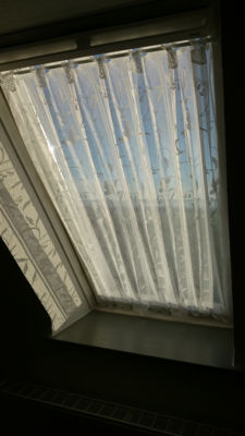 Attach the curtain to the skylight