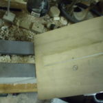 Underside protective board on the lathe