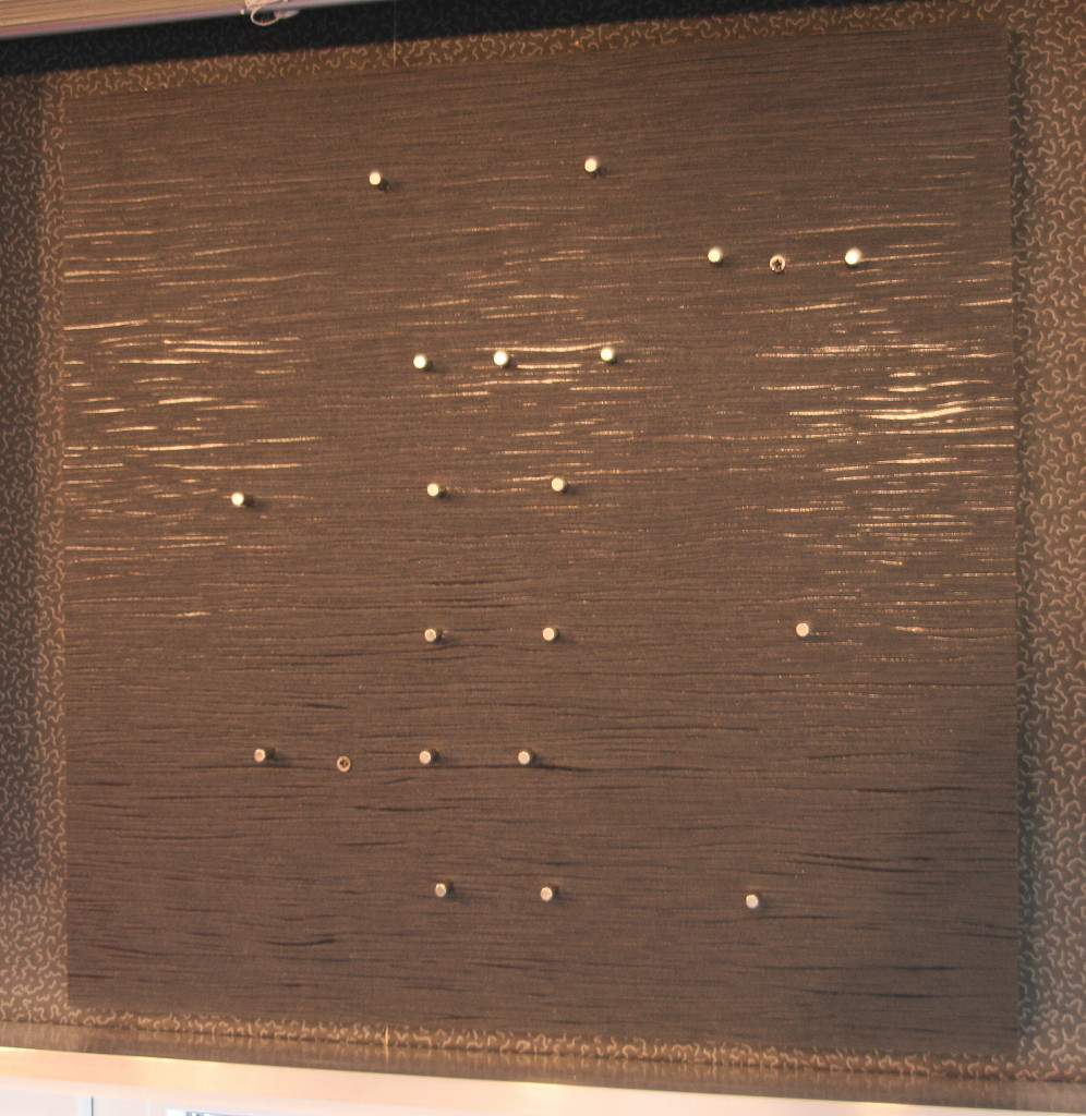 Rodmagnets on a wooden board