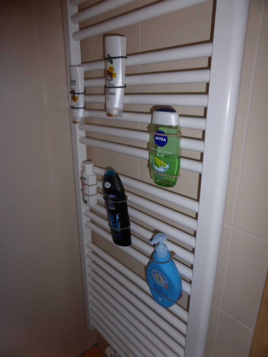 Magnetic elimination of bottle chaos in the shower