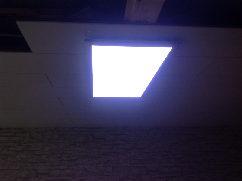Invisible ceiling mounting for light panels