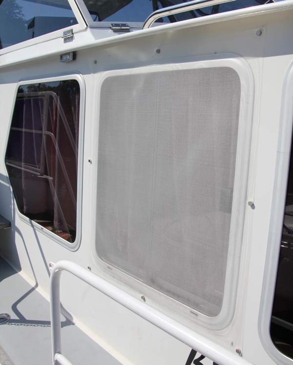 Fly screen on steel boat